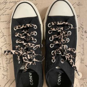 Amazing leopard print and black chucks. Only worn a few times. Size 6